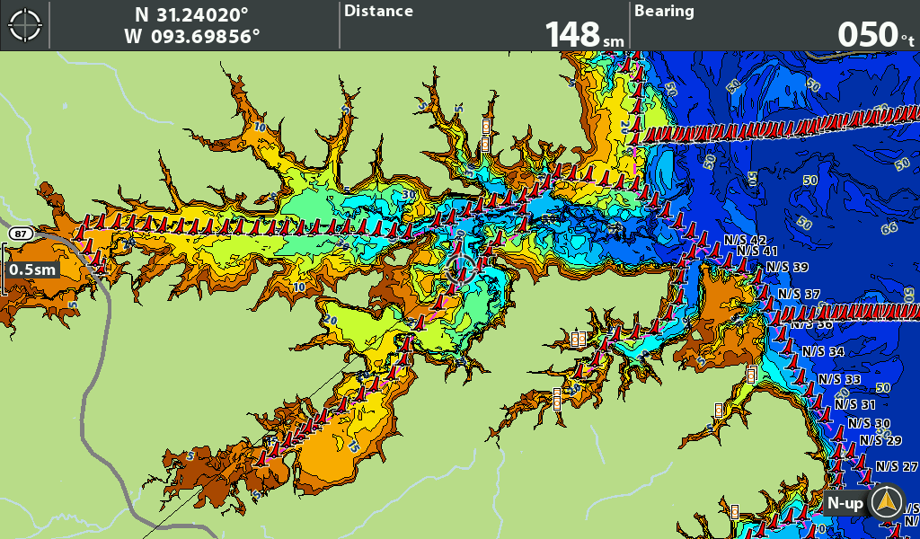 Detailed topographic map showing distance and bearing with color-coded elevation data for navigation purposes.