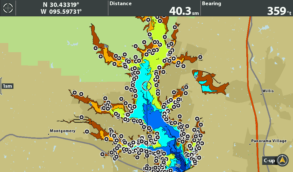 Detailed topographic map showing waterways, distance, and bearings near Montgomery, providing navigational information for boating.