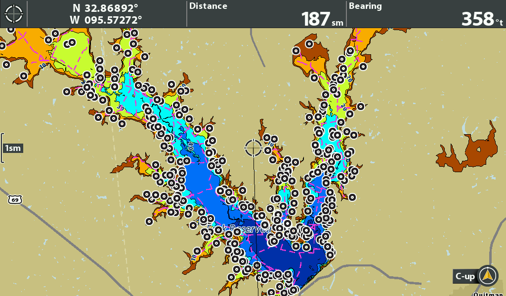 Navigation map showing detailed waterway, depth contours, and waypoints, with coordinates and distance markings.